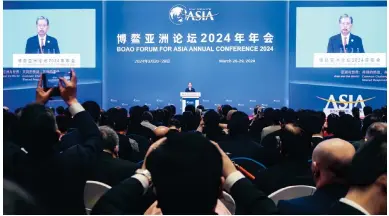  ?? Photo: Reuters ?? Zhao Leji delivers a speech at the opening ceremony of the Boao Forum for Asia in Hainan yesterday.