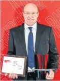  ??  ?? Rob Formby, the chief operating officer designate at Allan Gray, accepts the Morningsta­r Award for the Best Fund House Smaller Range.