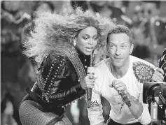  ??  ?? Beyonce and Chris Martin of Coldplay perform during the half-time show at the NFL’s Super Bowl 50 between the Carolina Panthers and the Denver Broncos in Santa Clara, California Feb 7. — Reuters file photo