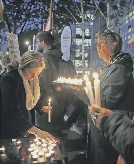  ?? PICTURE: HOLLIE ADAMS/PA ?? 0 A vigil outside the Home Office for the 39 people found dead inside a lorry in Essex