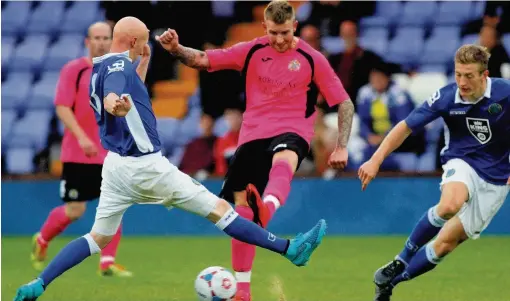  ?? Mike Petch ?? ●● Action from Macclesfie­ld’s win against Stockport County on Friday night