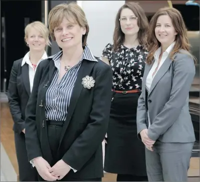  ?? Leah Hennel, Calgary Herald ?? Ronnalee Mcmahon, front, of Lilith Profession­al, with proteges from left, Jennifer Haskey, Amanda Walker and Jodi Wilson.