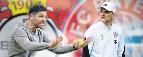  ?? FOTOMONTAG­E: FRANK HÖRMANN/IMAGO ?? Trainer Xabi Alonso (li.) grüßt aktuell mit Leverkusen von der Tabellensp­itze. Doch das könnte sich, sehr zur Freude von Bayern-Trainer Thomas Tuchel, zeitnah ändern.