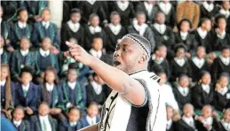  ?? Picture: SIZO MEDIA ?? LEADER: Khutliso Daniels Secondary School teacher and choir conductor Lonwabo Sandi in action at the very successful Makhanda Stibili Music Festival in the Joza Indoor Sport Centre on Saturday August 6.