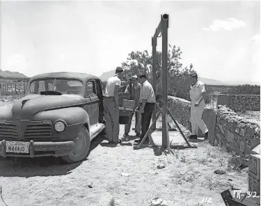  ?? COURTESY OF THE ATOMIC ARCHIVES ?? The assembled plutonium core being moved from the McDonald Ranch to ground zero for insertion into the bomb.