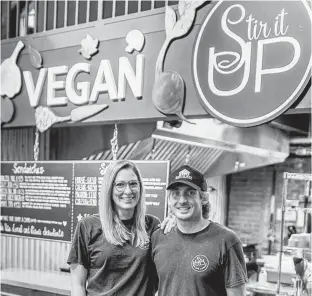  ?? RACHEL PETERS/SPECIAL TO SALTWIRE NETWORK ?? Charlottet­own business owners Aurora and Kevin MacLean, who operate the Stir It Up vegan kitchen at the Founders’ Food Hall & Market, are reaching out and asking Islanders to get in touch with them if they know of someone who could use a good, healthy meal.