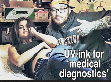  ?? ?? IT’S ‘MAGIC’: Keith McCurdy — who’s inked celebs like Selena Gomez (above) — says his Magic Ink, which uses UV light (below), could one day be a diagnostic tool for diabetes or sun exposure.