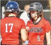  ?? KYLE FRANKO — TRENTONIAN PHOTO ?? Robbinsvil­le’s Allie Taylor (6) talks with teammate Kate Hunter (17) after scoring a run against West Windsor North during Wednesday’s game.