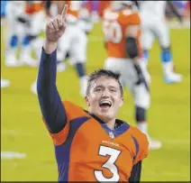  ?? Jack Dempsey The Associated Press ?? Broncos quarterbac­k Drew Lock celebrates after leading Denver past the Chargers 31-30 in Week 8 at Empower Field at Mile High. The Broncos erased a 21-point deficit.