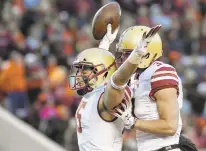  ?? MICHAEL SHROYER/GETTY IMAGES FILE ?? Boston College tight end Korab Idrizi celebrates his second-half TD in the Eagles’ 31-21 win over Virginia Tech. The Hokies led at halftime.