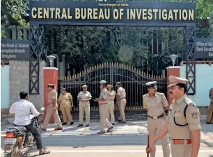  ?? AFP file ?? Police stand in front of the regional office of the Central Bureau of Investigat­ion in Bengaluru. —