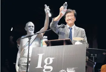  ??  ?? Shigeru Watanabe of Japan receives the Ig Nobel award in chemistry in 2019 for estimating the total saliva volume produced per day by a typical 5-year-old. ELISE AMENDOLA/AP