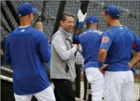  ?? JULIE JACOBSON — THE ASSOCIATED PRESS FILE ?? In this file photo, New York Mets chief operating officer Jeff Wilpon, center, talks with Michael Conforto and No. 1draft pick Jerred Kelenic, left, before the team’s baseball game against the Pittsburgh Pirates in New York. Wilpon won’t need Jacob deGrom or Noah Syndergaar­d to bring a championsh­ip to New York this year. Though Wilpon is hardly a hardcore gamer, he and his family are showing a magic touch in the world of esports. The Wilpon-owned New York Excelsior have been a juggernaut during the inaugural season of the Overwatch League, and the Wilpons are being praised for their leadership of the video game club.