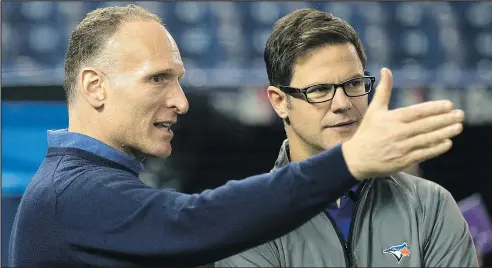  ?? — POSTMEDIA FILES ?? Blue Jays president Mark Shapiro, left, with GM Ross Atkins profess to “feel very good” about the team’s return for slugger Josh Donaldson, who was dealt to the Cleveland Indians late Friday night.