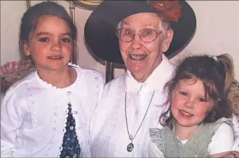  ??  ?? Bette Bearinger, known as Nana Bear, stands between Brooke Serra, right, and her sister, Jesse, when the girls were young. Jesse is a recent graduate of Slippery Rock University.