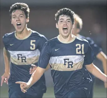  ?? Steph Chambers/Post-Gazette ?? Connor Hudson, left, and Anthony DiFalco react after DiFalco’s goal — the only goal of the game — in Franklin Regional’s 1-0 win against West Allegheny in the WPIAL Class 3A championsh­ip Thursday night at Highmark Stadium.