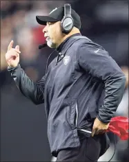  ?? Ellen Schmidt / Associated Press ?? Las Vegas Raiders interim head coach Rich Bisaccia motions towards the field during the second half against the Los Angeles Chargers on Sunday in Las Vegas.