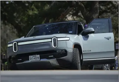  ?? (AP) ?? A Rivian sport-utility vehicle is displayed in Austin, Texas, in February 2024.