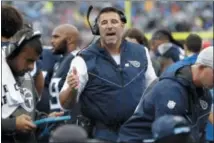  ?? AP PHOTO/JAMES KENNEY, FILE ?? In this Oct. 14, 2018, file photo, Tennessee Titans head coach Mike Vrabel talks to his players in an NFL football game against the Baltimore Ravens in Nashville, Tenn. Mike Vrabel won three Super Bowl rings playing linebacker and goal-line pass threat for Bill Belichick in New England. Now the rookie head coach gets his first crack at his former coach when Vrabel’s Titans host former teammate Tom Brady and the Patriots in a game Tennessee desperatel­y needs.
