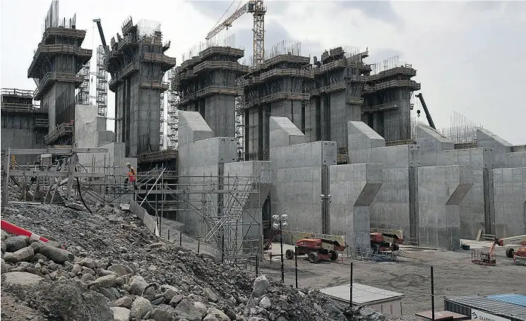  ?? ANDREW VAUGHAN / THE CANADIAN PRESS FILES ?? The Muskrat Falls hydroelect­ric project is looking like a catastroph­e now that cost overruns have driven the total cost to an estimated $12.7 billion, double the original estimate.