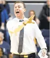  ?? JULIE BENNETT/ASSOCIATED PRESS FILE ?? James Madison’s new men’s basketball coach, Mark Byington, shown last season, has the benefit of the new Atlantic Union Bank Center.