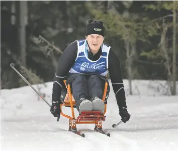  ?? ANDREW VAUGHAN / THE CANADIAN PRESS FILES ?? Quebec’s Christine Gauthier —above competing in the women’s para-nordic sit ski event at the 2011 Canada Games — was in the regular force field artillery for 10 years before a training accident in 1989 resulted in injuries to her knees, hips, neck and back, writes Michael Higgins.