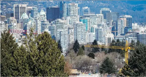  ?? DARRYL DYCK/THE CANADIAN PRESS ?? Under a controvers­ial tax proposal, British Columbians would pay 0.5 per cent of the value of any secondary residence annually — with exemptions for any property worth less than $400,000. B.C. says the tax is needed to help cool down prices.