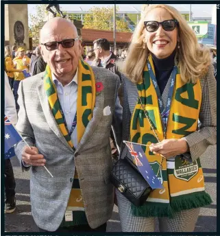  ??  ?? THE BIG MATCH:
Rupert Murdoch and new partner Jerry Hall at the World Cup final