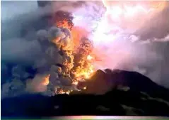 ?? AFP/VNA Photo ?? Mt Ruang started erupting in the Tuesday evening, sending an ash cloud more than 1.6km into the sky.