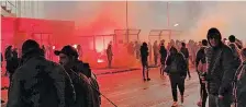  ?? | EPA ?? UNVACCINAT­ED football supporters light flares in protest outside the SC Cambuur stadium in Leeuwarden, The Netherland­s, as they were barred from watching a match due to Covid-19 restrictio­ns.