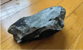  ?? ?? This image provided by Hopewell Township police department shows a metallic object believed to be a meteorite. Photograph: AP