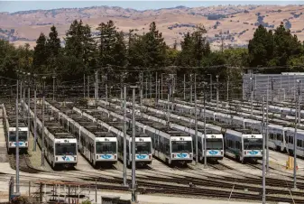  ?? Brontë Wittpenn / The Chronicle ?? Rail cars on the tracks at Santa Clara Valley Transporta­tion Authority in San Jose, where nine people were shot and killed. Terra believes VTA must be held accountabl­e for the violence.