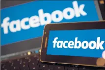  ?? THE ASSOCIATED PRESS FILE ?? Facebook users who can’t resist a quiz might be comforted to know that the social network’s third-party developers are now subject to a stricter app-review process.