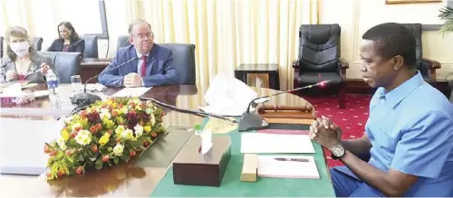  ??  ?? President Edgar Lungu (right) with David Young, Charge d ‘ Affairs at the American Embassy in Zambia. During a meeting on the Margins of the Commemorat­ion of the USAID/Zambia 2019 -2024 Developmen­t Strategy at State House in Lusaka.PICTURE BY SALIM HENRY/STATE HOUSE