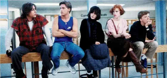  ??  ?? The Breakfast Club works to break down stereotype­s and by the end, the kids are all right — starring Judd Nelson, left, Emilio Estevez, Ally Sheedy, Molly Ringwald and Anthony Michael Hall.