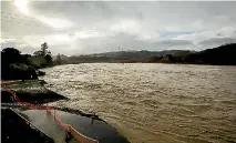  ?? PHOTO: DAVID UNWIN/STUFF ?? The flooded Manawatu River at Ashhurst could have undone work designed to provide temporary protection for the Ashhurst Domain.