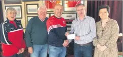  ?? ?? Noreen O’Callaghan, Ber O’Callaghan and Dick Gardner joined club chairman Kieran O’Keeffe to make a presentati­on to our recent lotto jackpot winner, Brian O’Riordan.