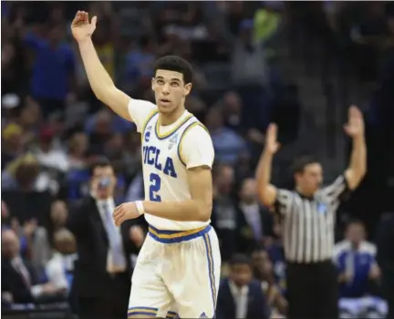  ?? STEVE YEATER — THE ASSOCIATED PRESS ?? UCLA guard Lonzo Ball (2) celebrates after hitting a three-point shot against Cincinnati during a second-round game in the NCAA college basketball tournament in Sacramento on Sunday. UCLA won 79-67.