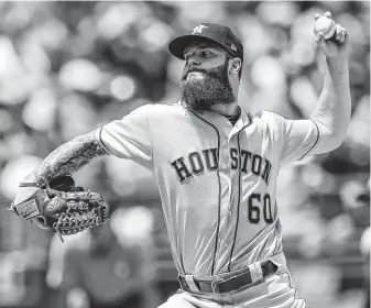  ?? Brian Davidson / Getty Images ?? Astros lefthander Dallas Keuchel went six innings Saturday to pick up his fourth win of the season against eight losses. He gave up two unearned runs, which dropped his ERA to 4.15.