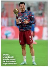  ?? ?? Awards… Lewandowsk­i was also named the Bundesliga’s Player of the Year