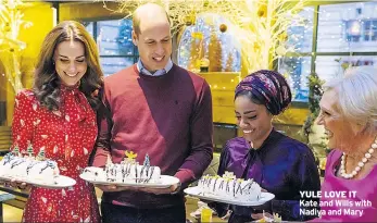  ??  ?? YULE LOVE IT Kate and Wills with Nadiya and Mary