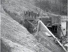  ?? CHATTANOOG­A NEWS-FREE PRESS PHOTO/JOHN GOFORTH VIA CHATTANOOG­AHISTORY.COM ?? This 1953 newspaper photo shows constructi­on of the Missionary Ridge Tunnel expansion. Constructi­on of the original tunnel was delayed frequently due to crumbling soil and rock.