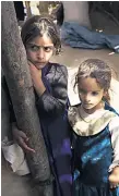  ??  ?? INNOCENT VICTIMS Young girls who have escaped war