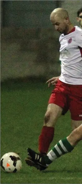  ??  ?? Stephen Murphy of Newfoundwe­ll challenges Rock Celtic’s DavyWard for the ball in Blackrock on Friday night.
LEFT: Daniel Kerr of Rock Celtic and Dean Carolan of Newfoundwe­ll battle for the ball.