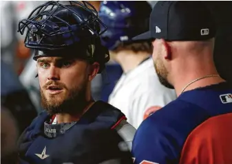  ?? Karen Warren / Houston Chronicle ?? In his sixth season with the organizati­on, catcher Max Stassi, left, finally has secured a hard-earned role with the Astros, and it’s one he is making the most of so far.