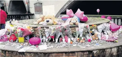  ??  ?? ●●A memorial outside Merseyway shopping centre, in memory of the victims of the Manchester bombing