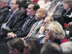  ??  ?? Janet difiore, chief judge of the Court of Appeals and the State of new York, right, listens to Gov. Andrew Cuomo’s budget address and state of the state on tuesday at the egg in Albany.