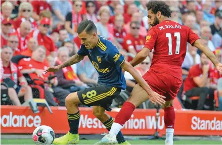  ?? Photo: Evening Standard ?? Liverpool’s Mohamed Salah (right) in action against Arsenal’s Dani Ceballos in their English Premier League match at Anfield Stadium in Liverpool, England on on August 25, 2019.