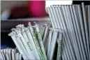  ?? JUSTIN SULLIVAN / GETTY IMAGES ?? Many disability advocates oppose straw bans, noting that paper straws and reusable straws may not work as well for disabled people.