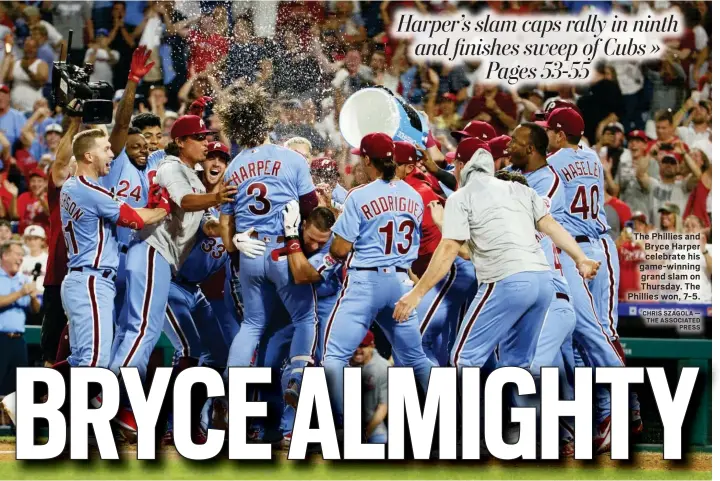  ?? CHRIS SZAGOLA — THE ASSOCIATED PRESS ?? The Phillies and Bryce Harper celebrate his game-winning grand slam on Thursday. The Phillies won, 7-5.